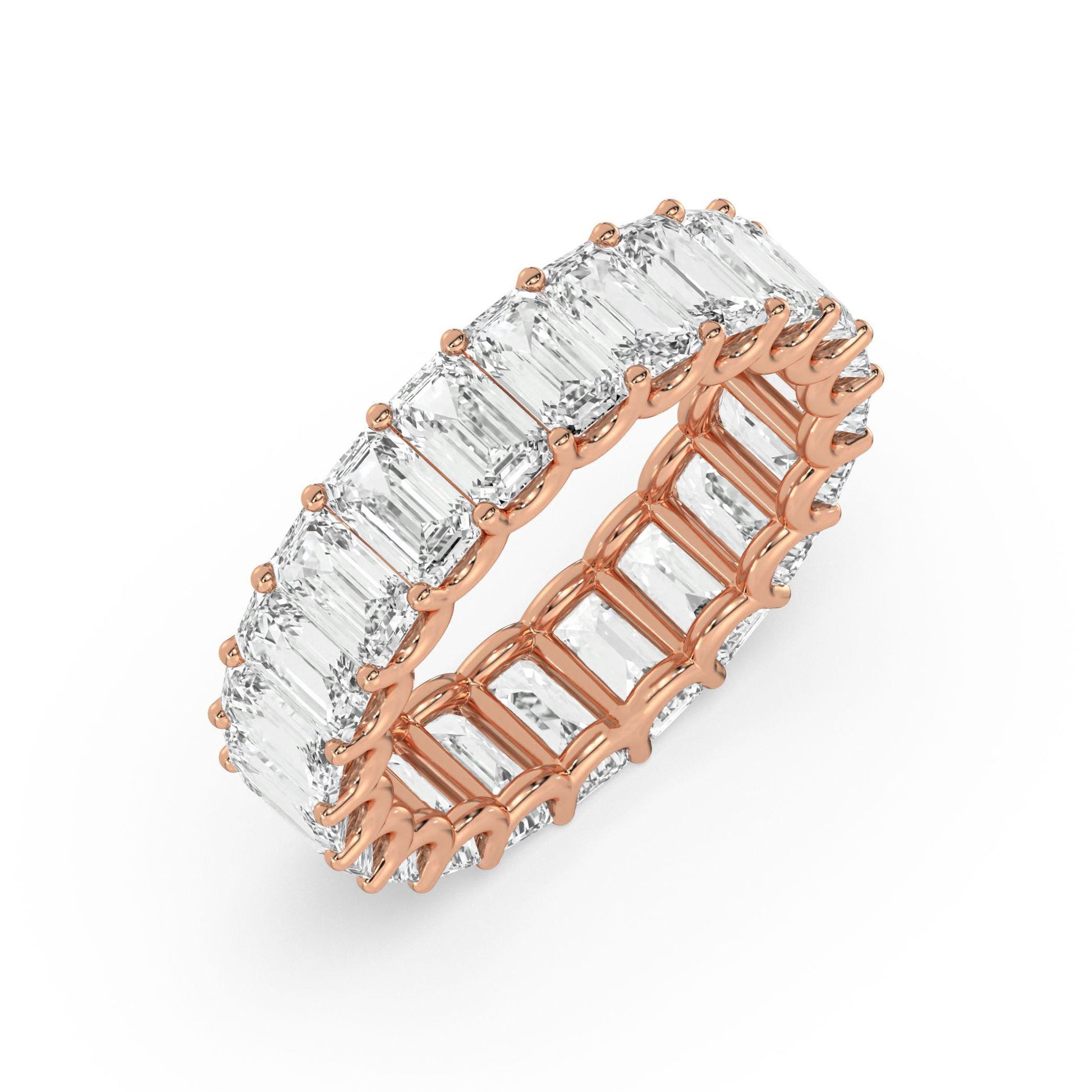 Angled view of rose gold Emerald Cut Eternity Wedding Ring with sparkling moissanite stones in a full eternity design.