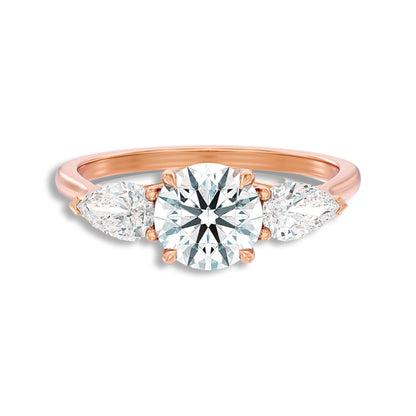 Round With Side Two Pear Shaped Three Stone Ring