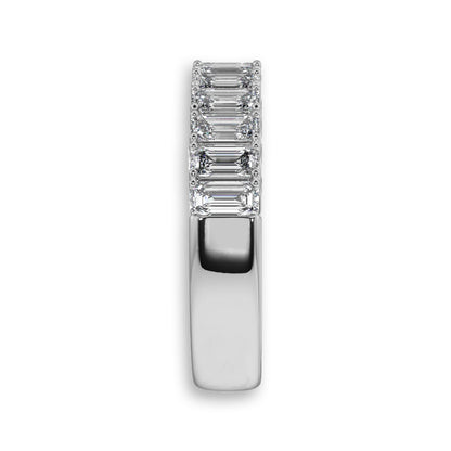 Side profile of white gold emerald cut diamond wedding band. Features lab-grown diamonds in a classic half eternity setting.