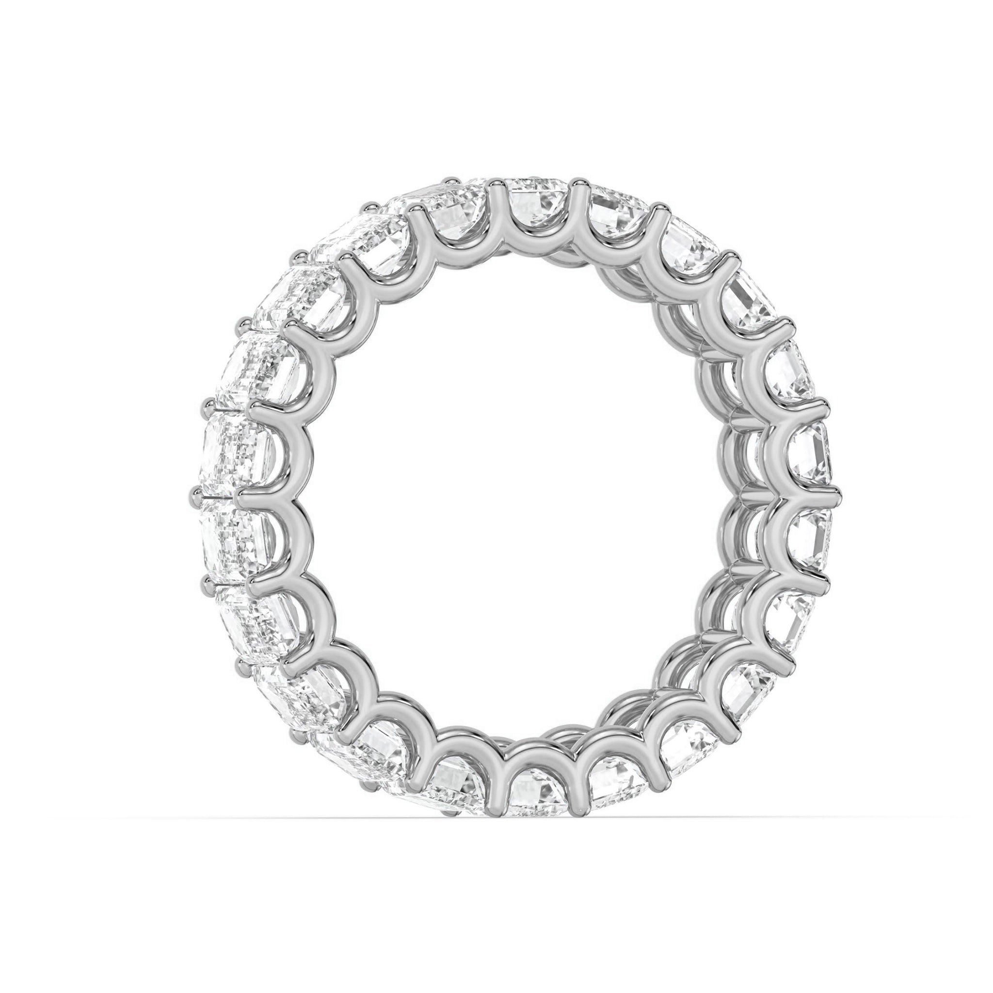 Side profile of white gold Emerald Cut Eternity Wedding Ring showcasing continuous moissanite brilliance.