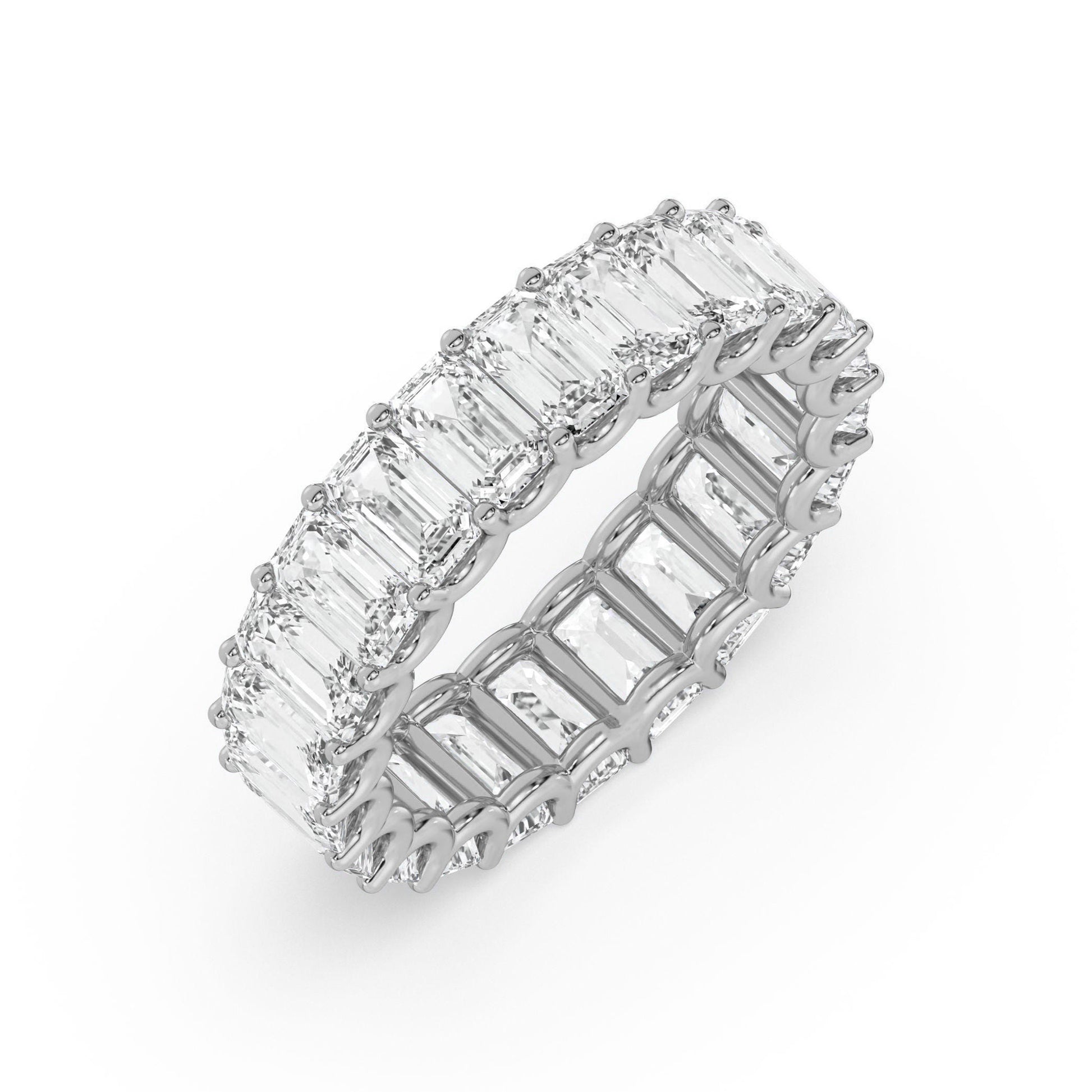 Angled view of white gold Emerald Cut Eternity Wedding Ring with radiant moissanite stones in a full band.