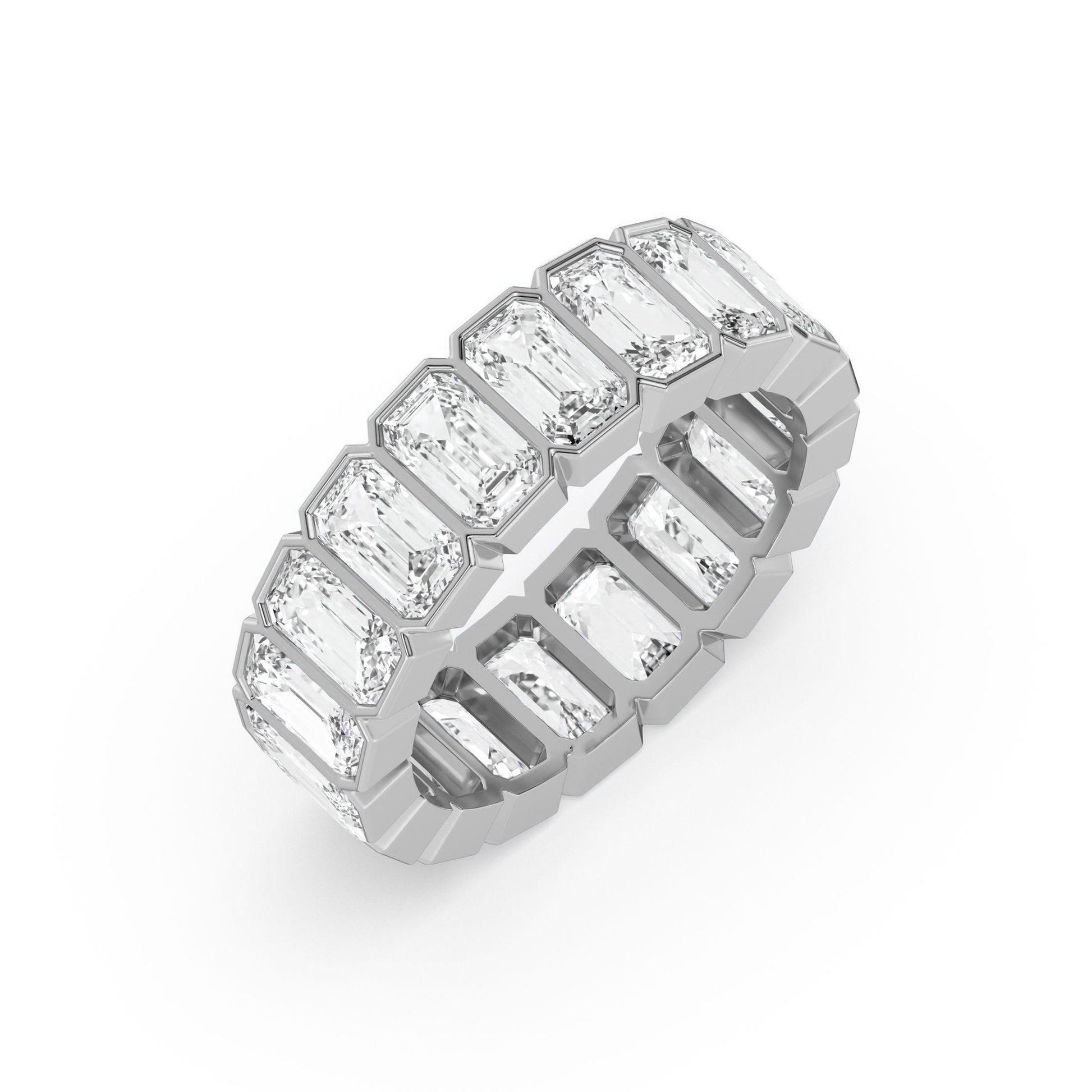 Angled view of white gold Emerald Cut Wedding Band featuring full eternity step-cut diamonds in a sleek bezel setting.
