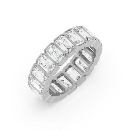 Angled view of white gold Emerald Cut Wedding Band featuring full eternity step-cut diamonds in a sleek bezel setting.