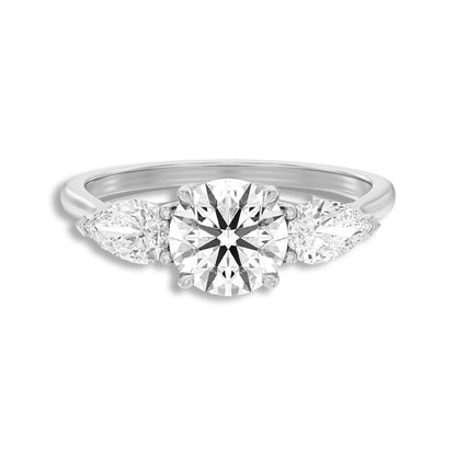 Round With Side Two Pear Shaped Three Stone Ring