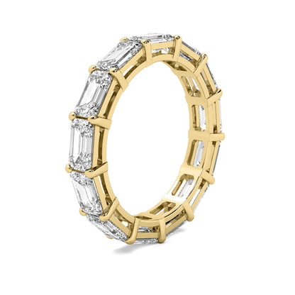Side profile of yellow gold Emerald Cut Eternity Wedding Band with emerald-cut moissanite diamonds in a prong setting.