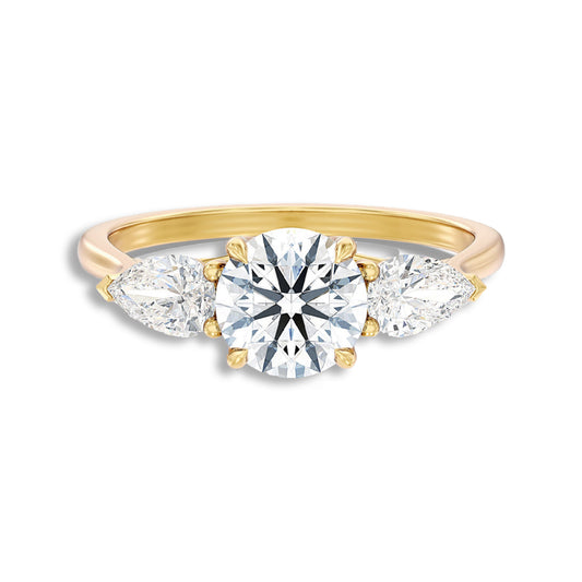 Round With Side Two Pear Shaped Three Stone Ring