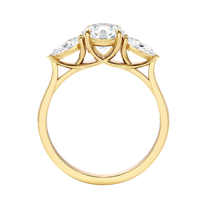 Round With Side Two Pear Shaped Three Stone Ring