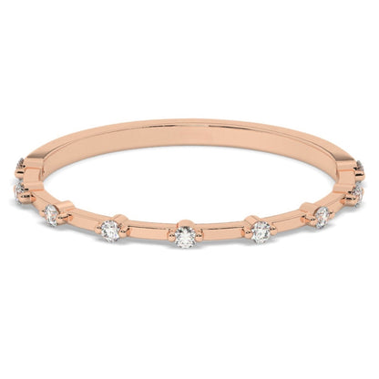 Diamond Wedding Band - Minimalist in rose gold with evenly spaced round lab diamonds, perfect for stacking or wearing as a delicate wedding ring.