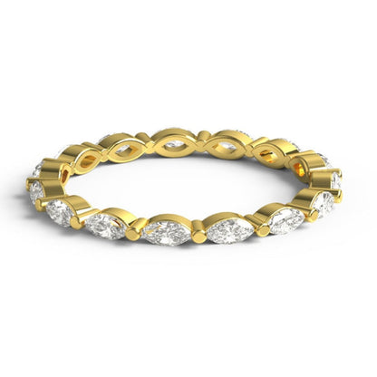 Marquise Diamond Wedding Ring in yellow gold with lab-grown diamonds in a delicate single prong setting, perfect for stacking or as a wedding band.