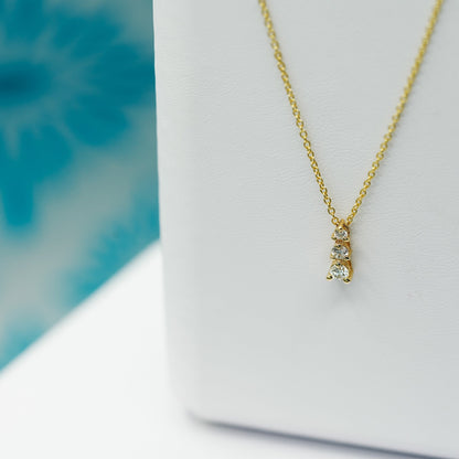 Vertically Graduated Three Stone Diamond Pendant Necklace