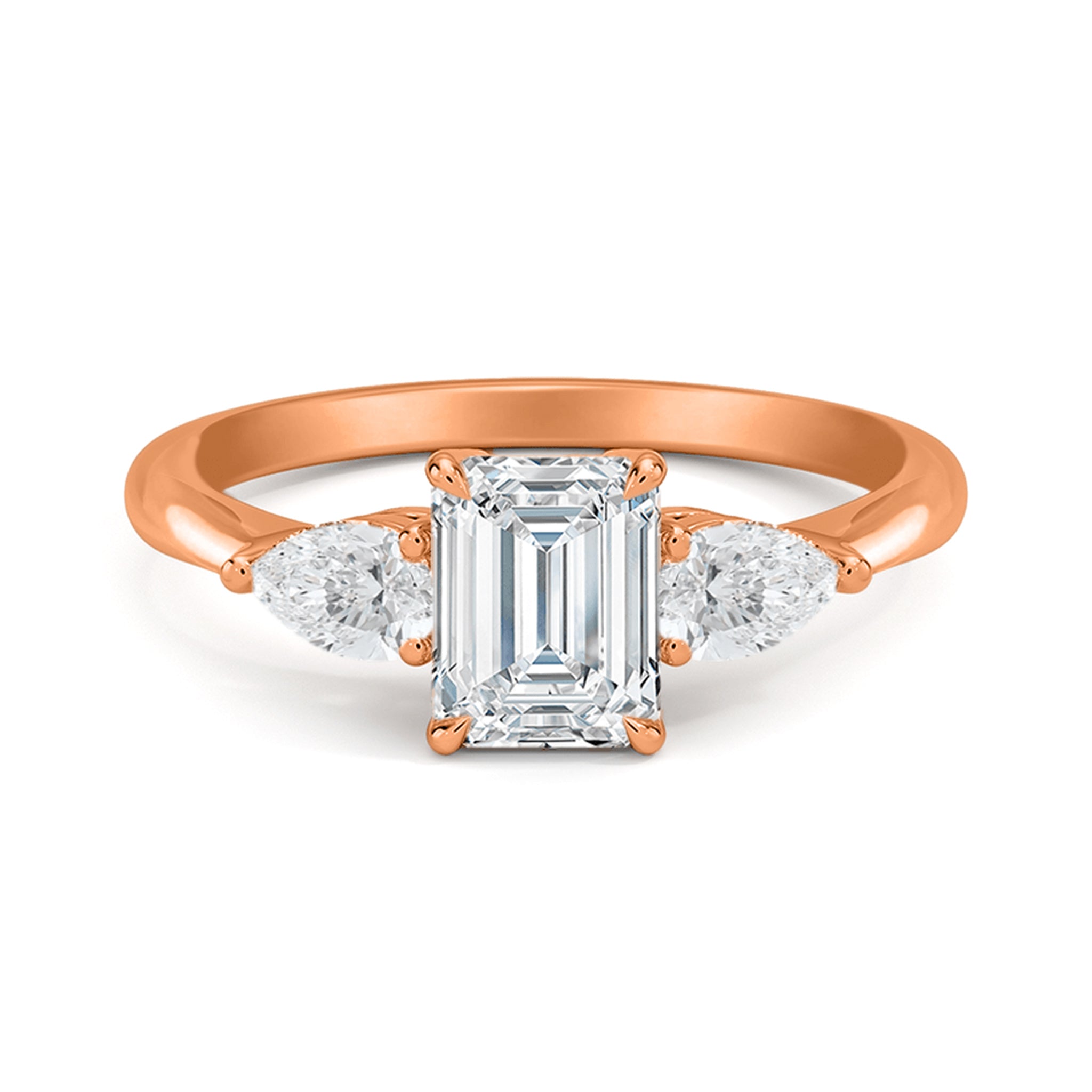 Emerald and Side Two Pear Three Diamond Ring