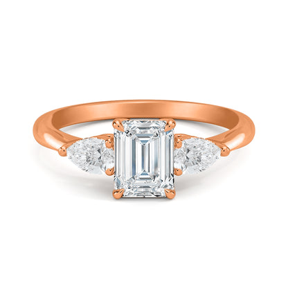 Emerald and Side Two Pear Three Diamond Ring