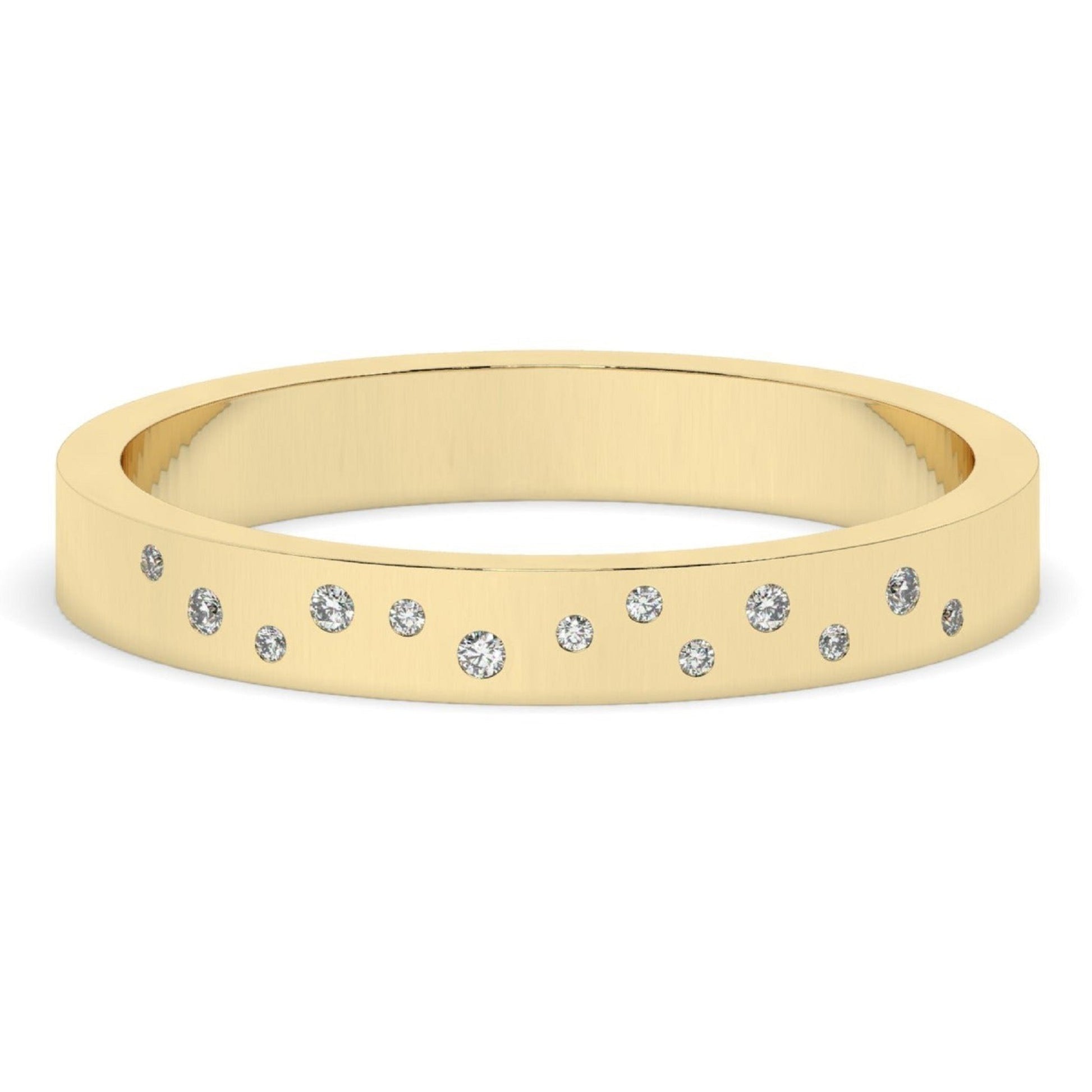 Flush Set Diamond Wedding Band in yellow gold with scattered lab-grown diamonds for a modern, elegant look. Ideal for women's wedding jewelry.