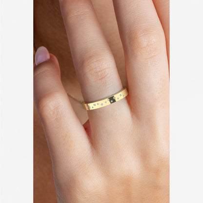 Yellow gold Flush Set Diamond Wedding Band worn on hand, showing scattered lab diamonds and sleek profile. Ideal for modern bridal jewelry styling.