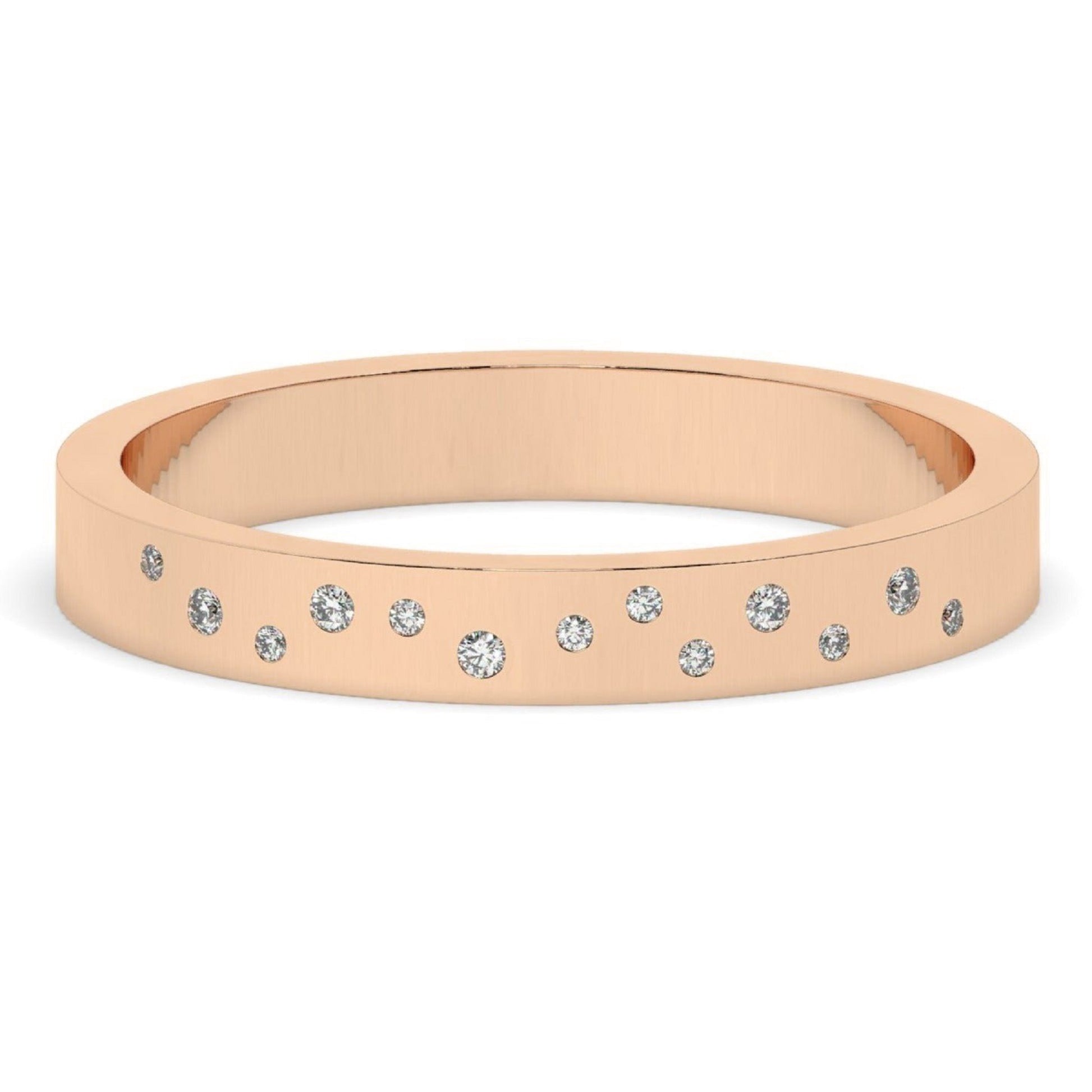Rose gold Flush Set Diamond Wedding Band with lab-grown diamonds set flush in a scattered design. A romantic and modern wedding ring option.