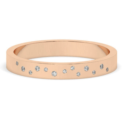Rose gold Flush Set Diamond Wedding Band with lab-grown diamonds set flush in a scattered design. A romantic and modern wedding ring option.