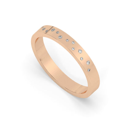 Angled view of rose gold Flush Set Diamond Wedding Band with scattered flush-set lab diamonds. Elegant and stylish for everyday or wedding wear.
