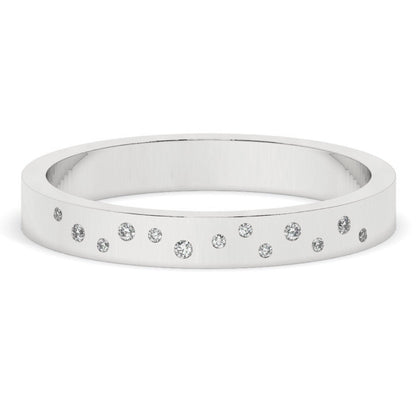 White gold Flush Set Diamond Wedding Band with flush-set lab diamonds in a scattered pattern. A minimalist and timeless wedding ring choice.