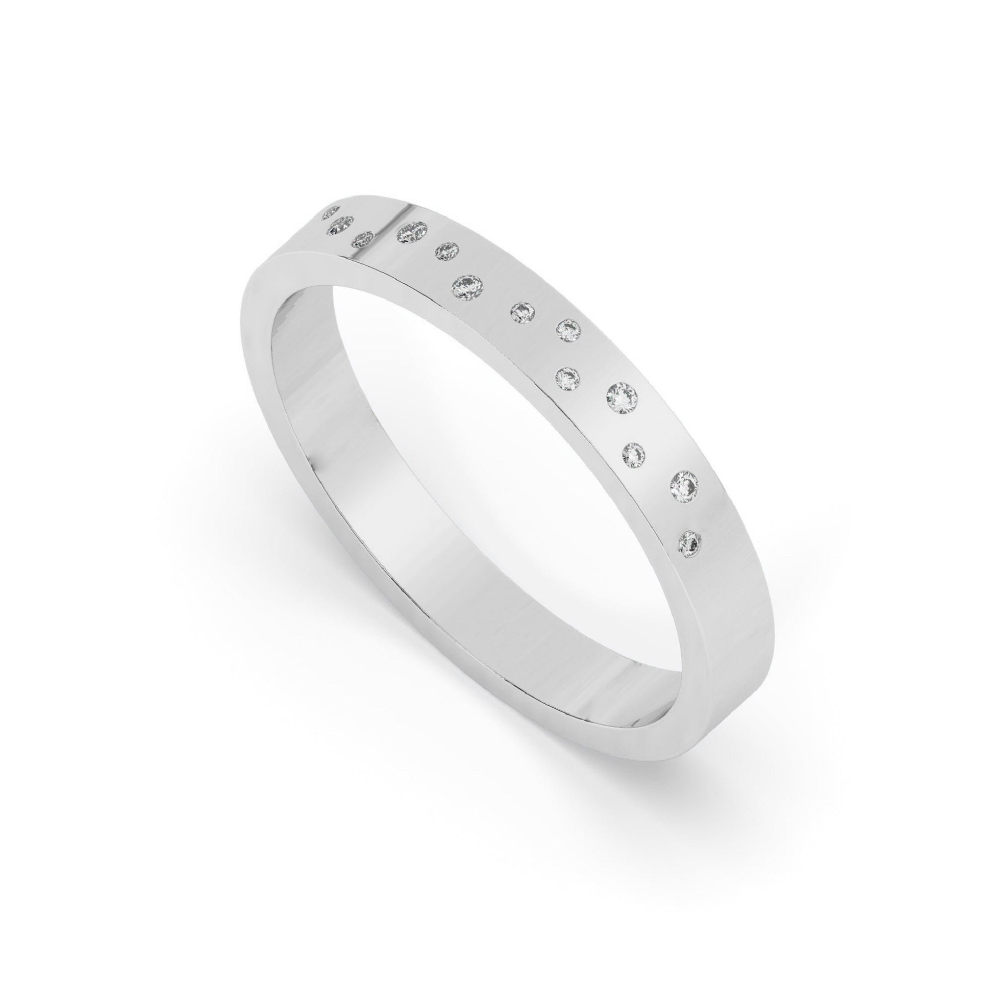 Top angled view of white gold Flush Set Diamond Wedding Band showcasing modern scattered lab diamond placement. Perfect for matching wedding sets.
