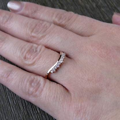 Rose gold Round Diamond Tiara Ring worn on hand, showcasing its elegant chevron shape and sparkling round diamonds.