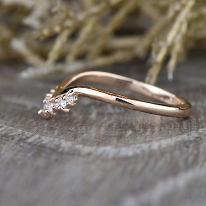 Angled view of rose gold Round Diamond Tiara Ring showing its delicate curve and shimmering diamond details.