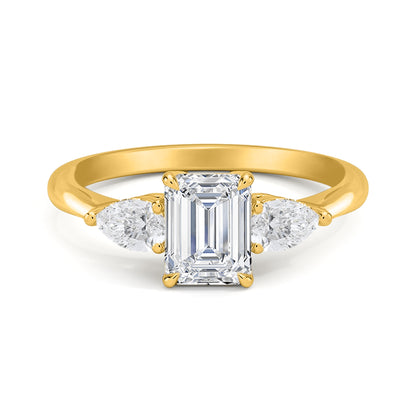 Emerald and Side Two Pear Three Diamond Ring